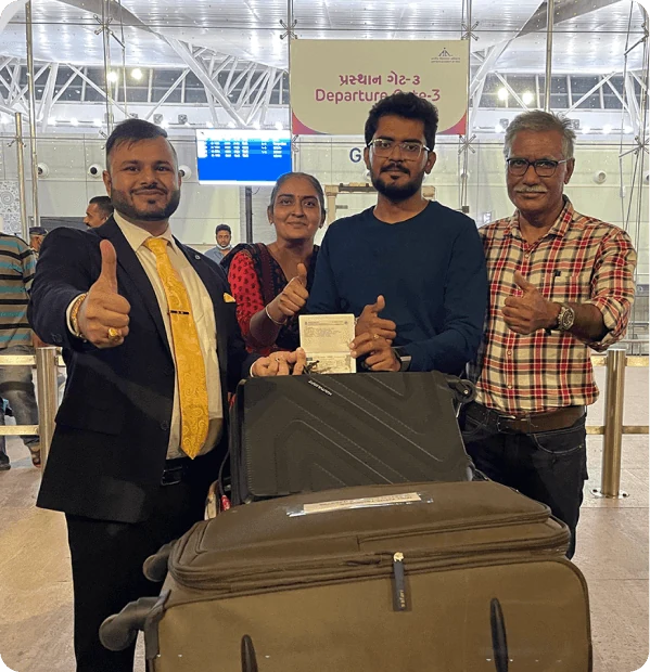 Students at the airport with their luggage